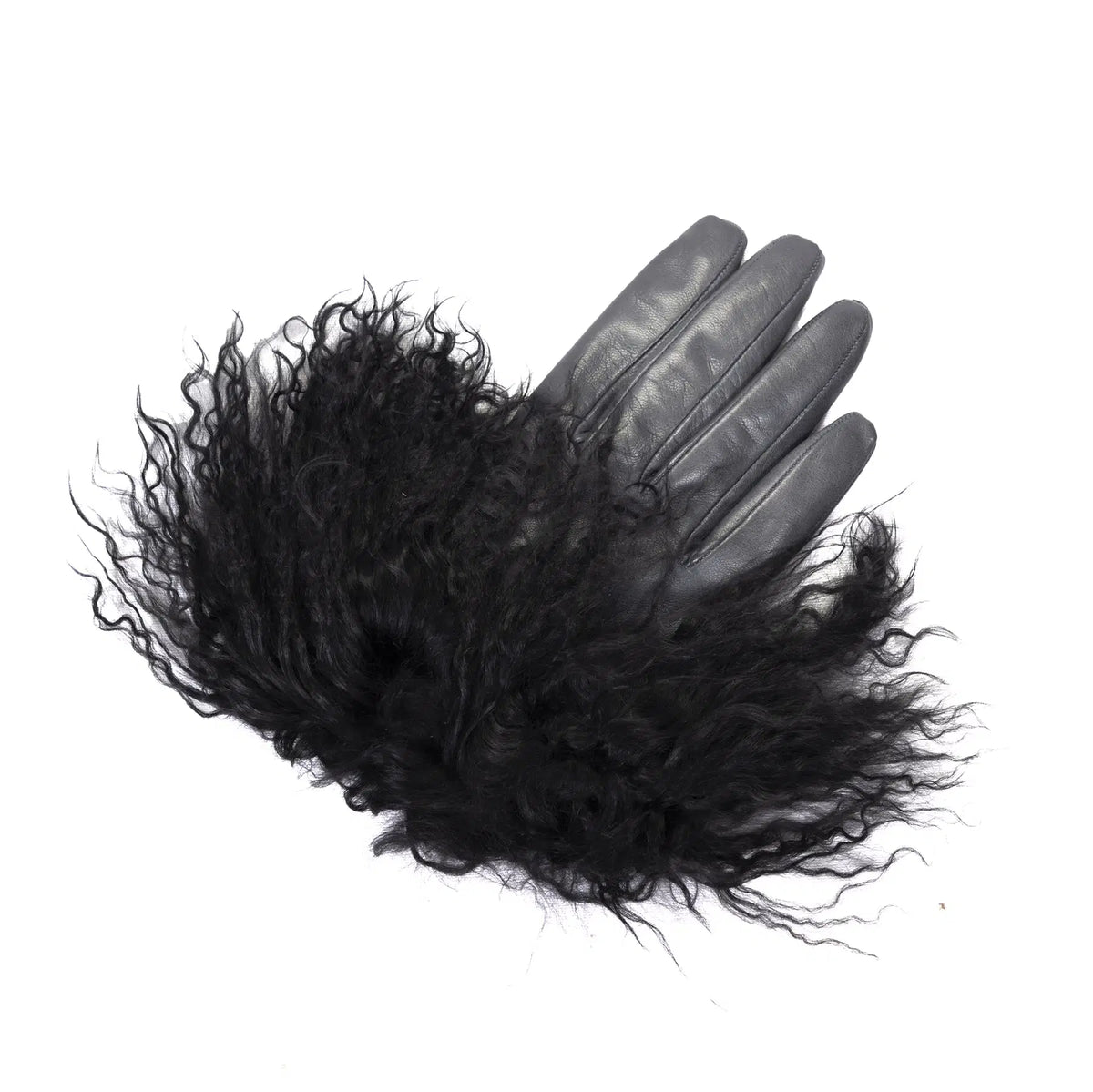 Womens gloves in soft black nappa leather, accented with luxurious pluffy Mongolian fur for added elegance and warmth.