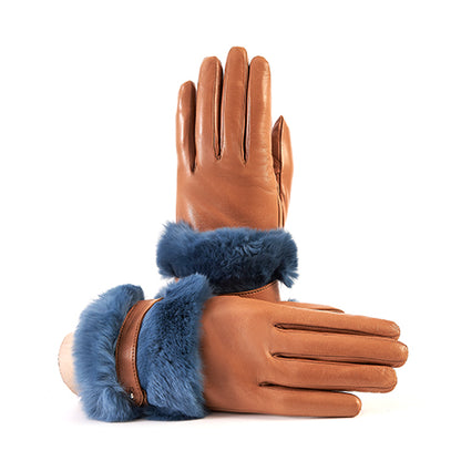 Ladies' tan nappa leather gloves featuring a large blue fur cuff and strap, lined with soft cashmere for added warmth.